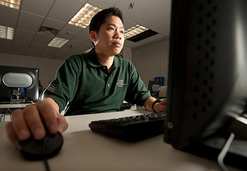 student working on computer