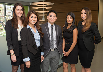 group of business professionals posing for the camera