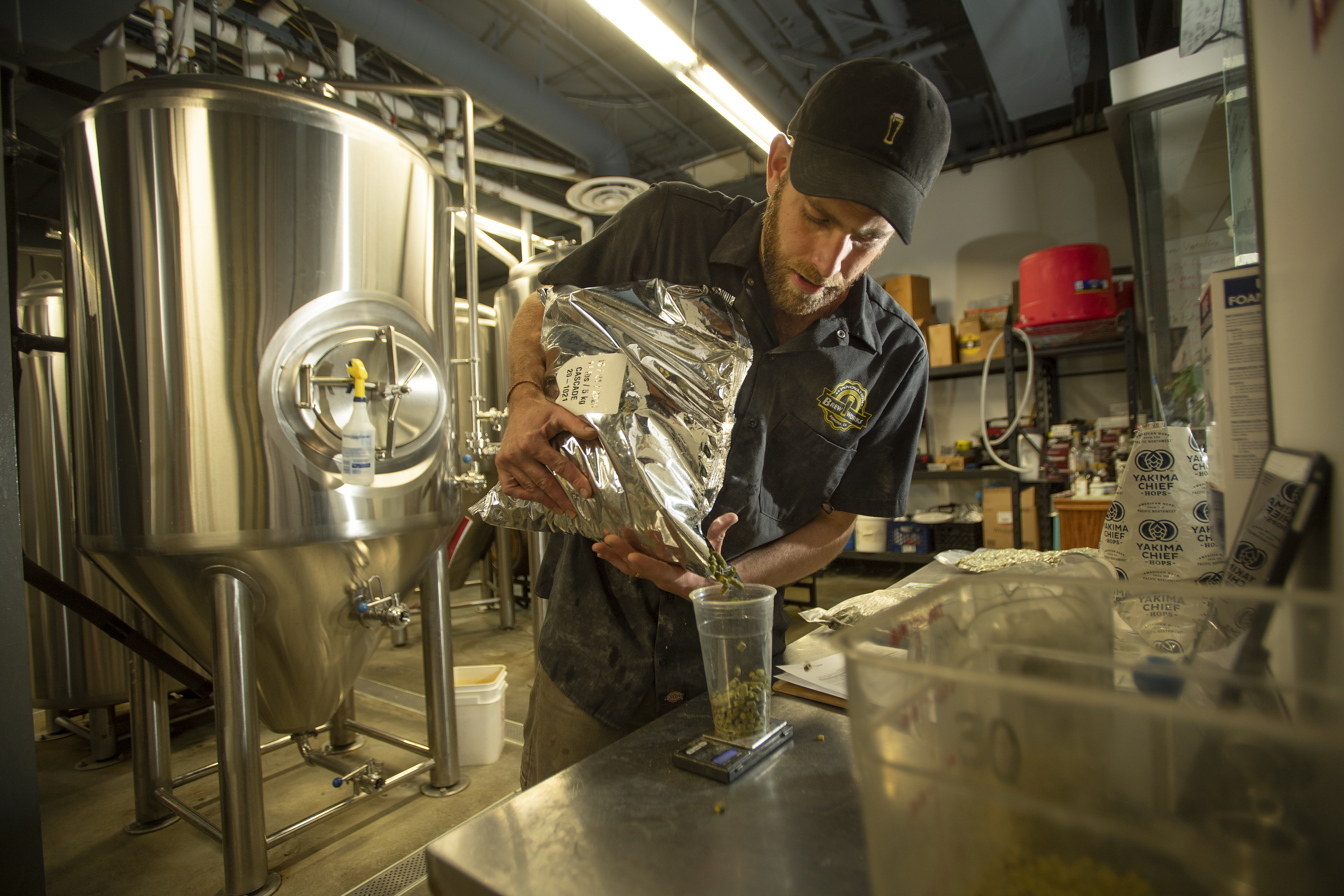 Instructor pouring beer