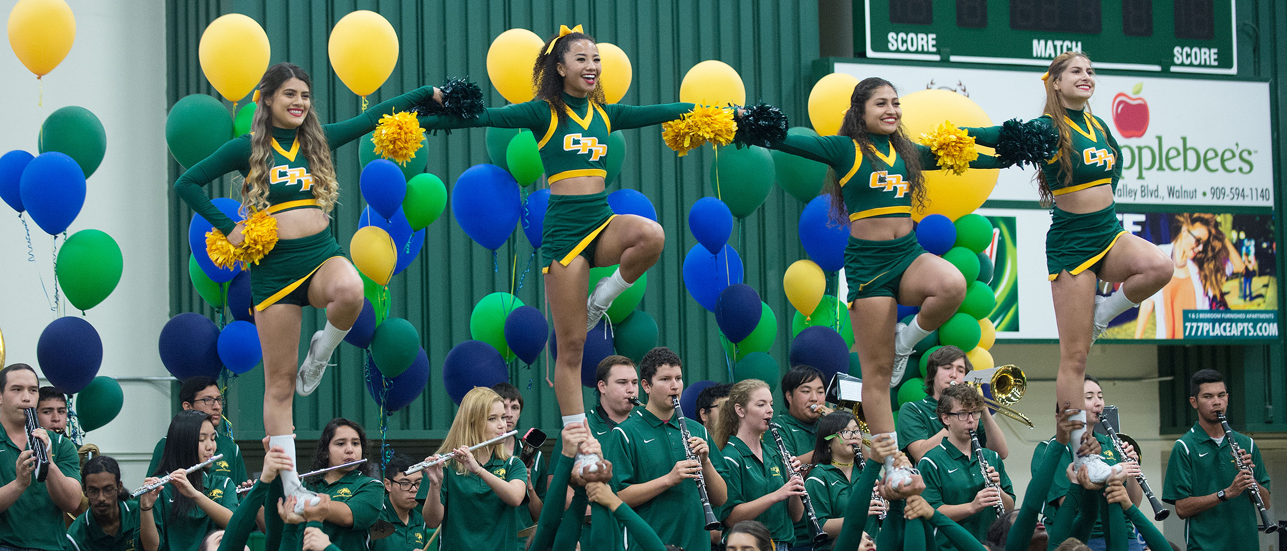 Pep rally cheerleaders at cpp fest