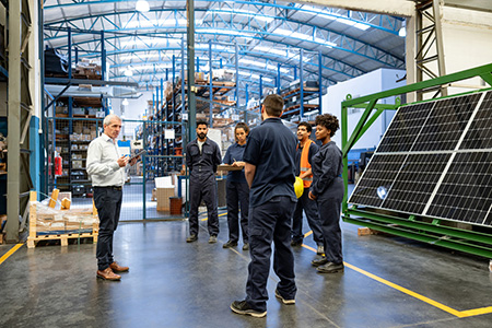 manager talking to latin employees