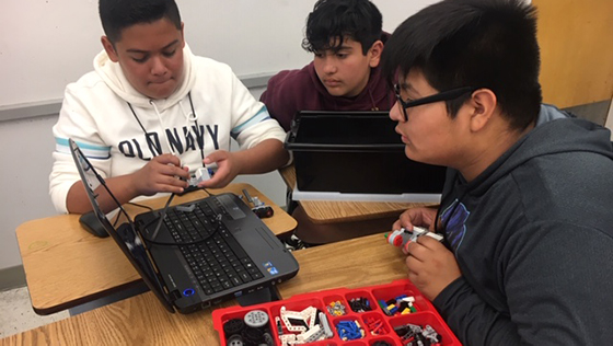 3 students working