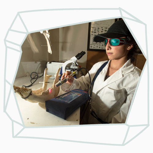 Female student with a microscope