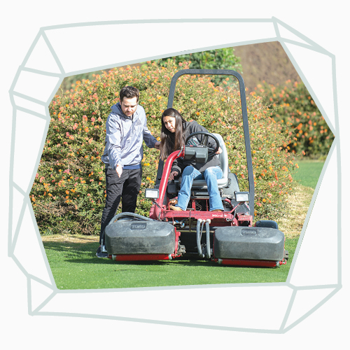 Turf management students on a field.