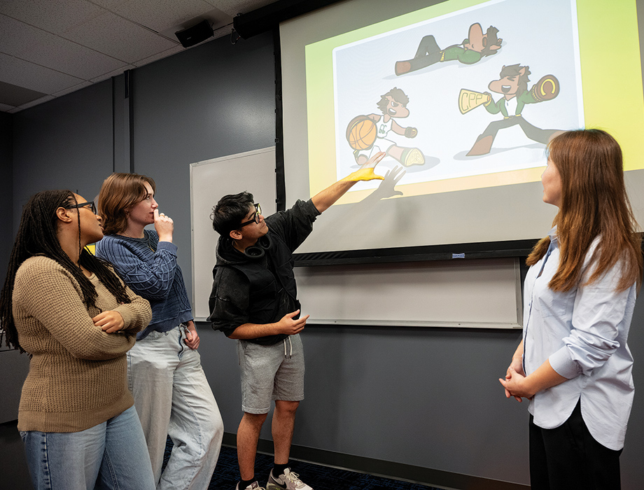 Design students discuss their project together