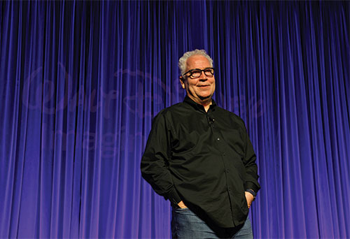 Bob Weiss speaking on a stage