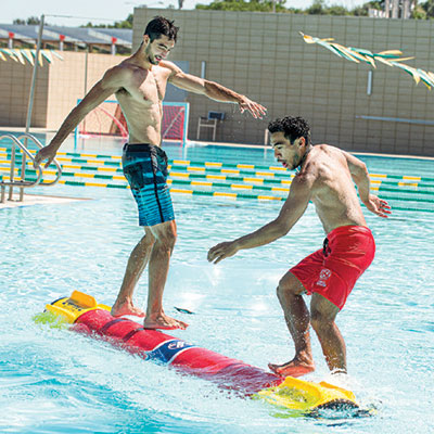 Two male students in the BRIC pool