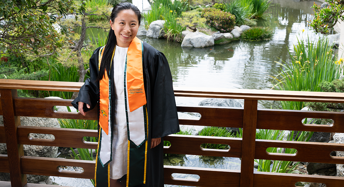 Susanna Eng poses at the Aratani Japanese Garden on campus.