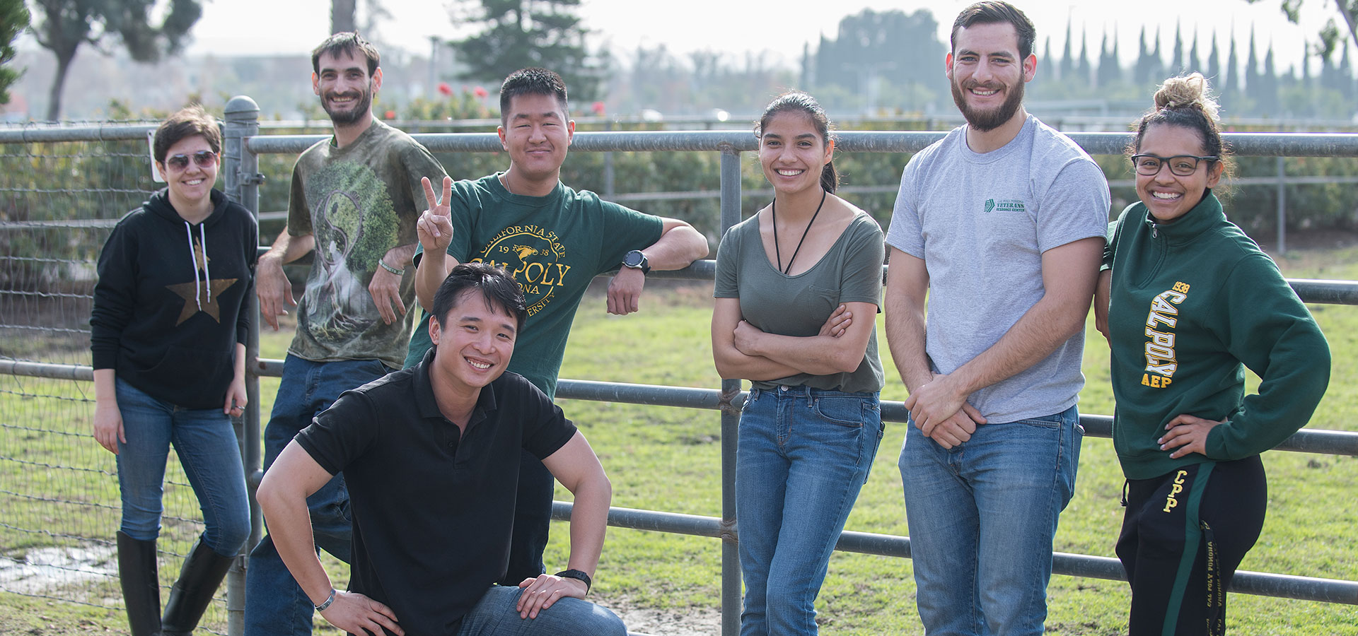 Group of veteran students pose for a photo at the Arabian Horse Center