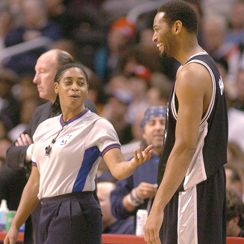 Violet Palmer shares a laugh with the San Antonio Spurs' Robert Horry