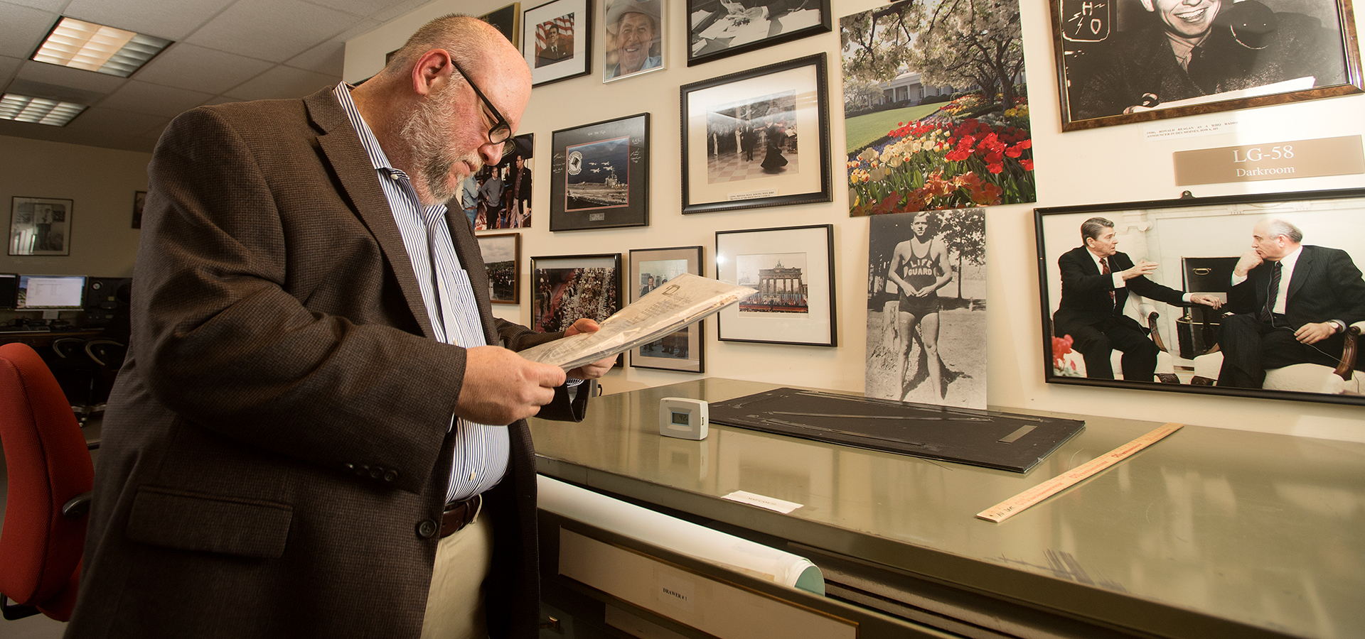 Ira Pemstein looking at artifacts and exhibit items at the Regan Library. 