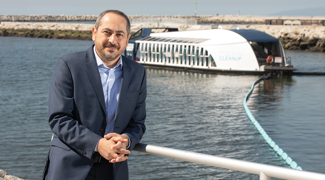 Rami Gindi with a Ballona Creek Trash Interceptor vessel