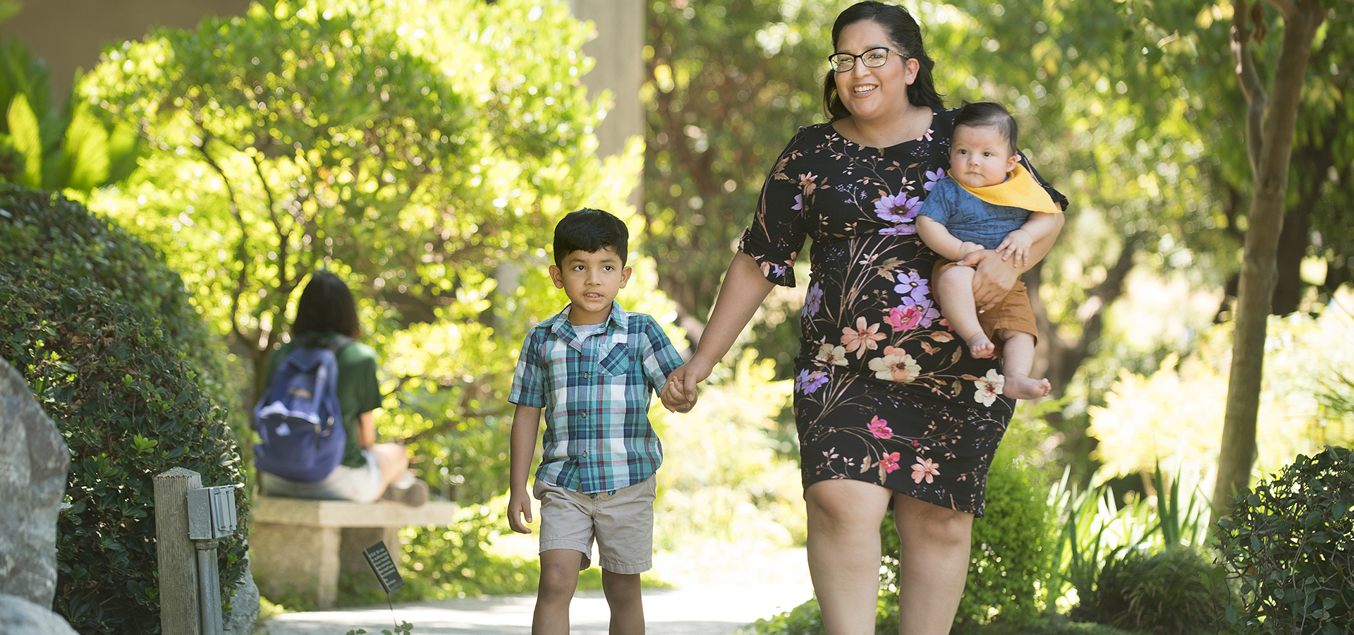 Ana Ramirez holds her two sons.