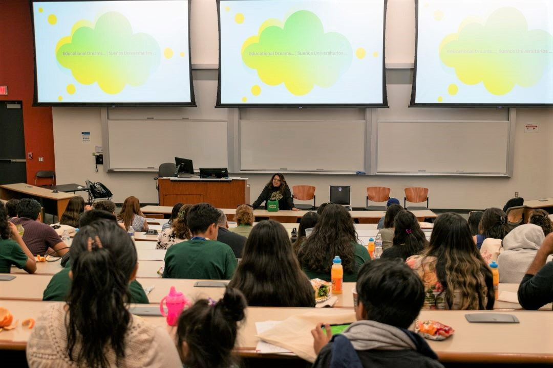 picture of lecture hall full of middle school students