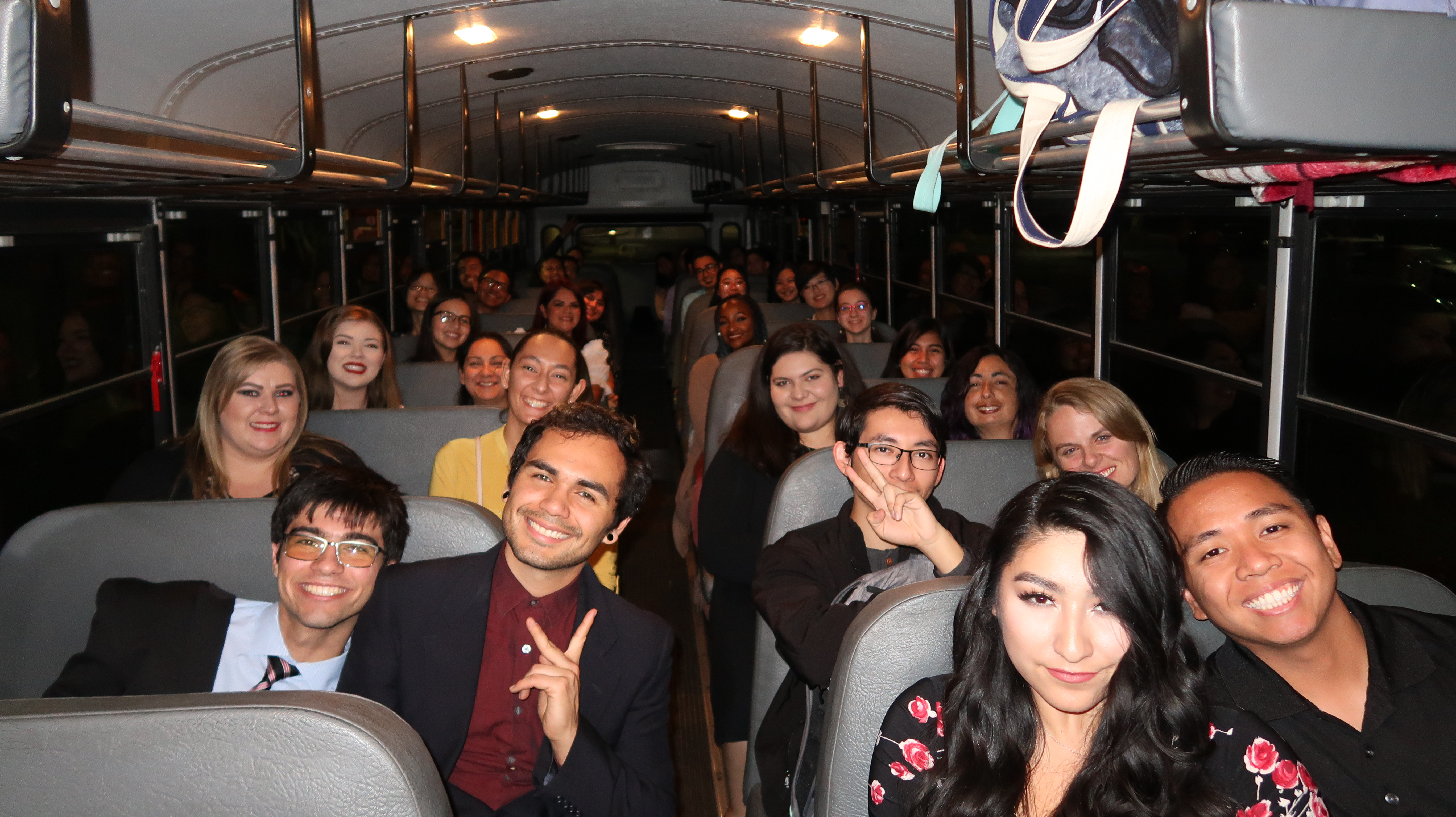 ARCHES students on the bus to attend the Newsies event