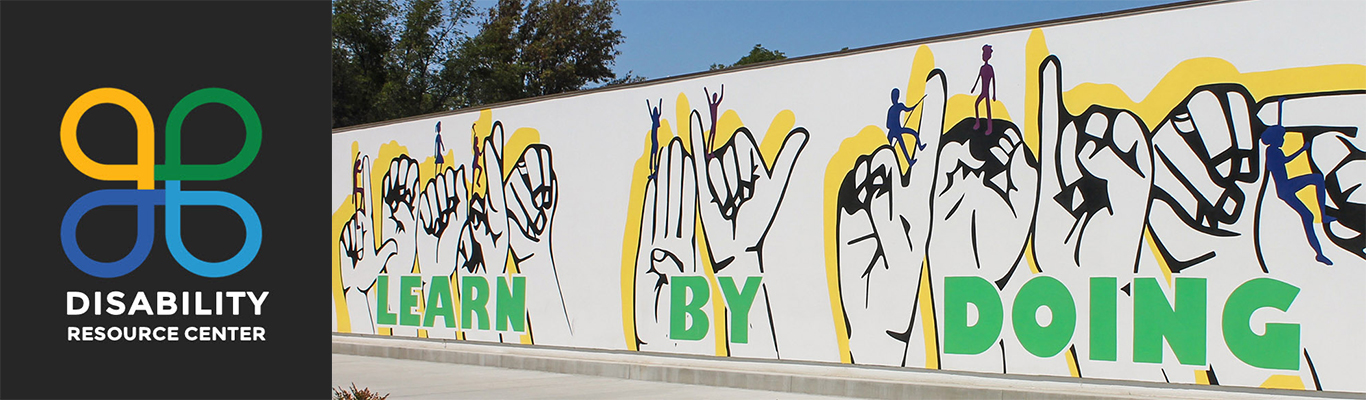 learn by doing mural depicting sign language