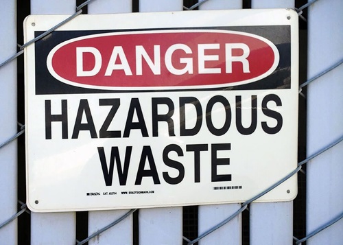 White hazardous waste sign
