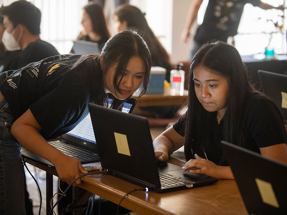 woman speaking into a microphone