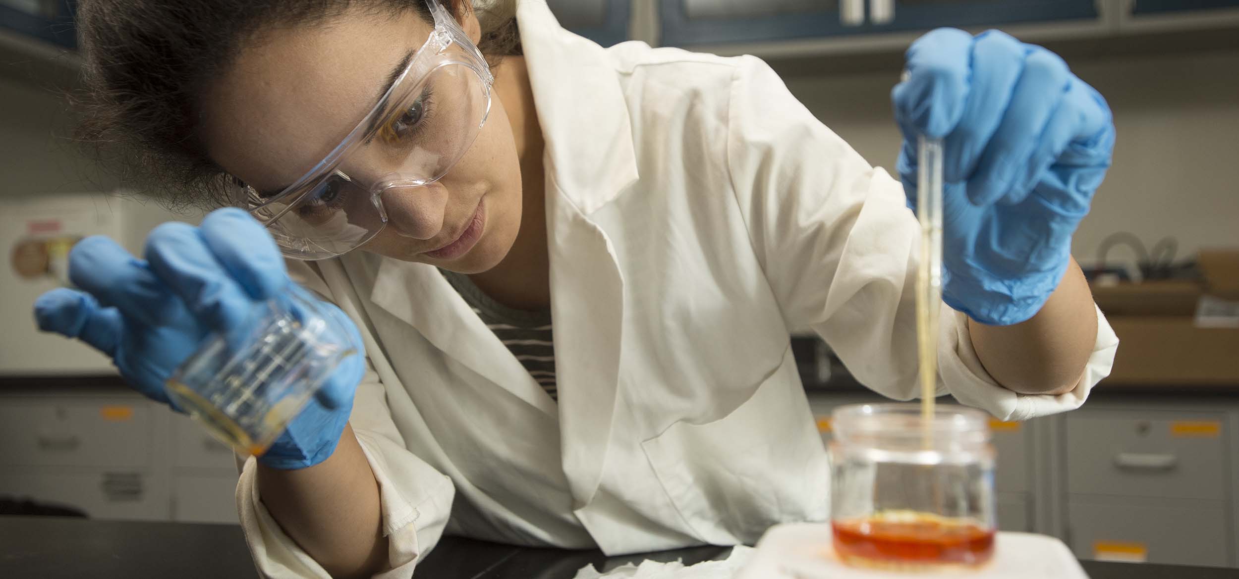 An engineering student working in a lab.