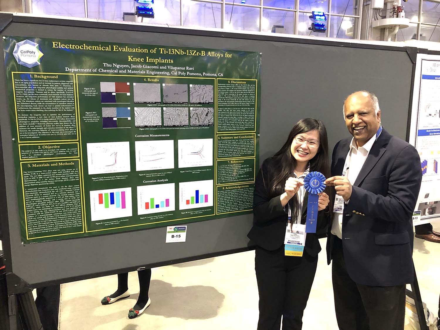 CPP engineering student and professor recieving a first place award at a conference