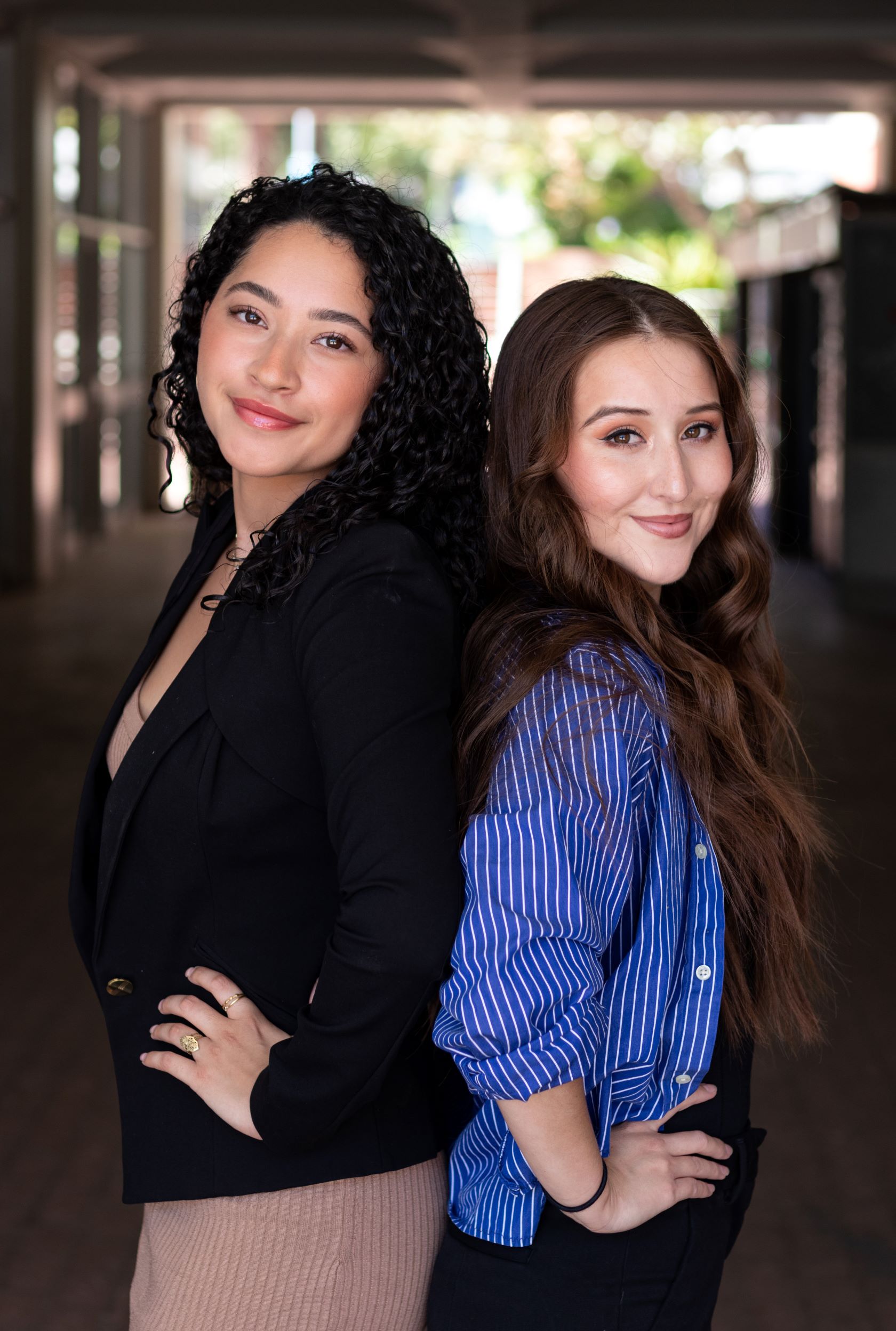 Two female engineering students, side by side.