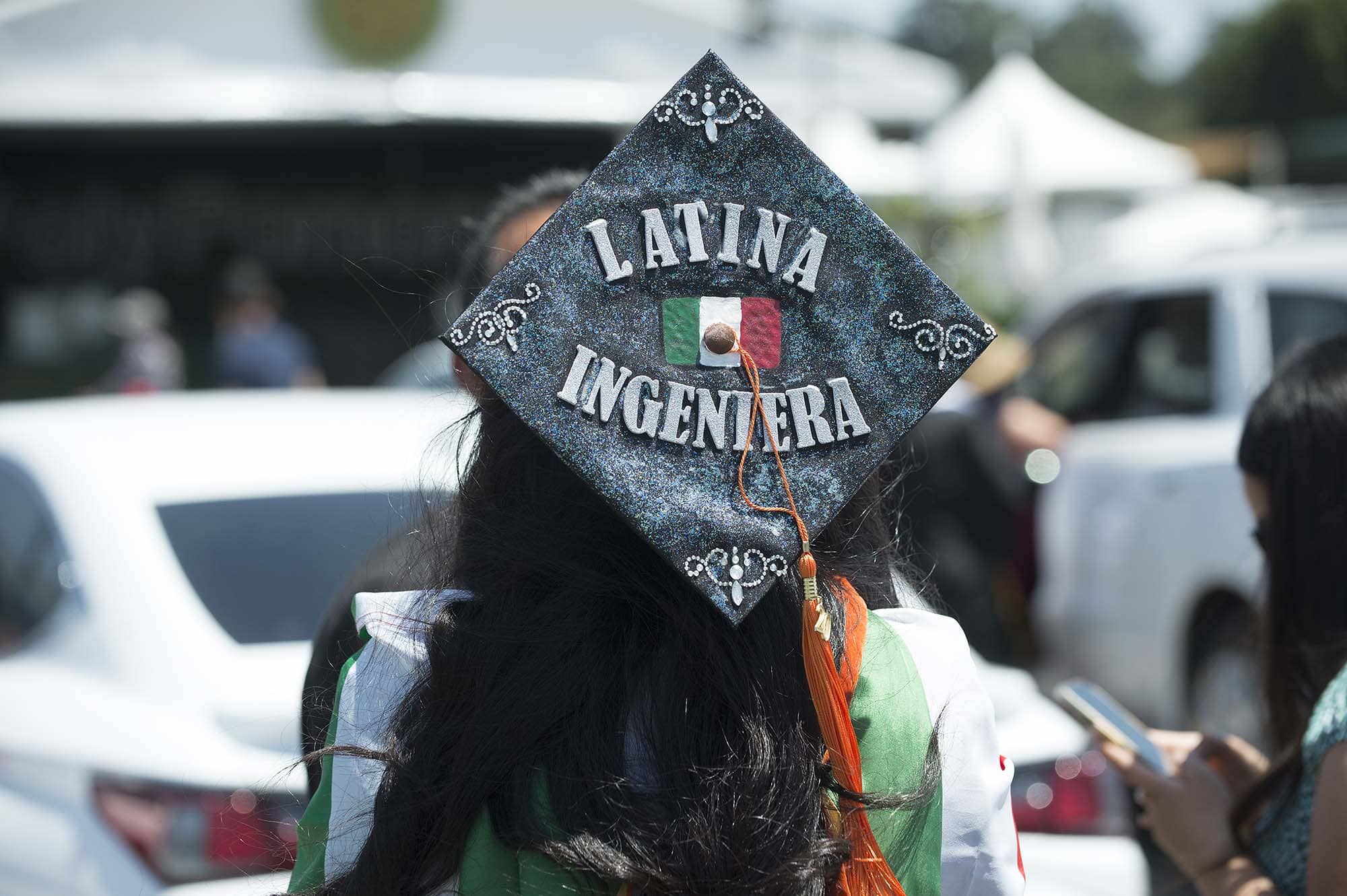 A graduate's mortarboard that reads: Latina Engineer