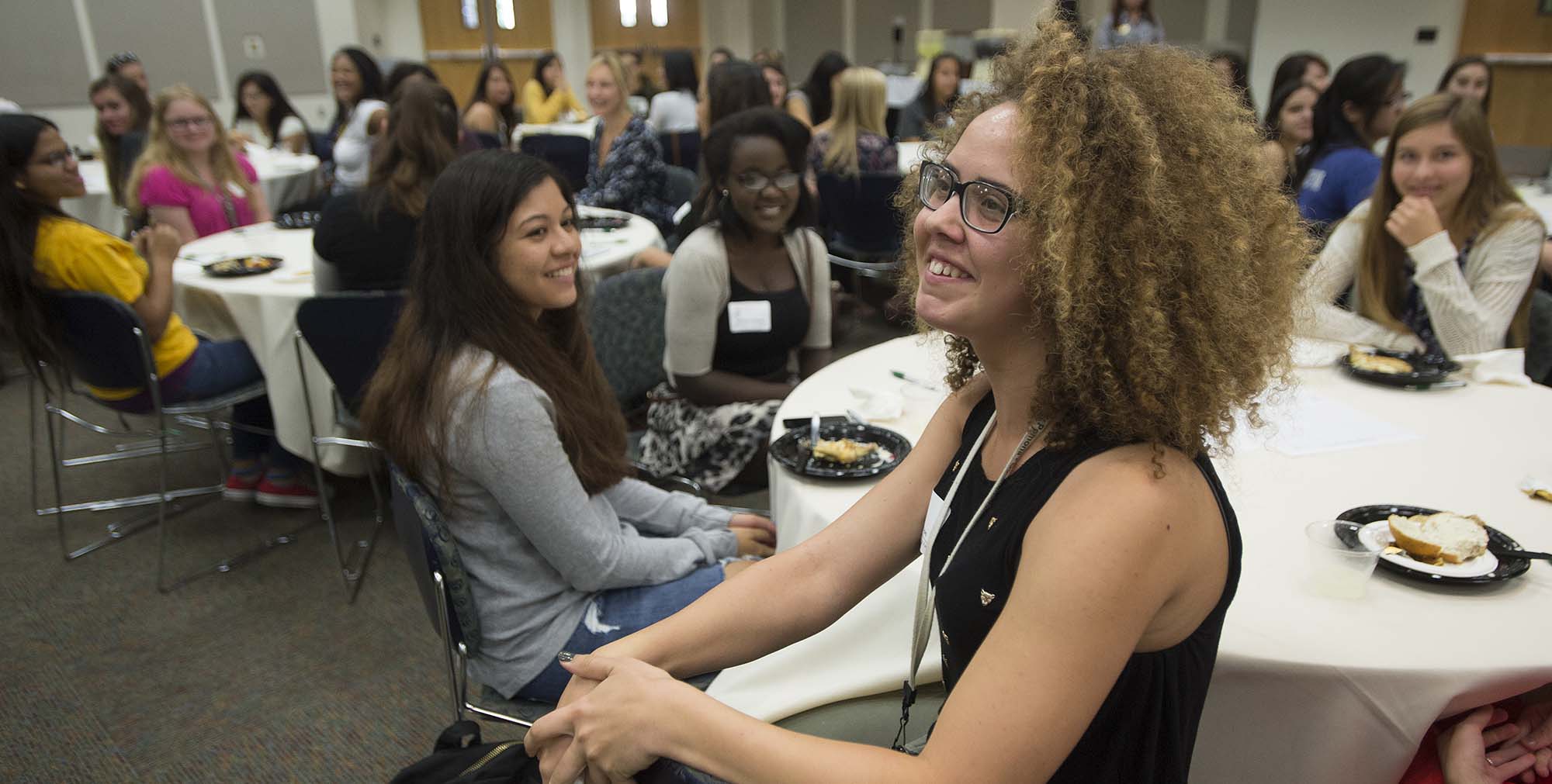 Dozens of CPP Engineering female students having lunch.