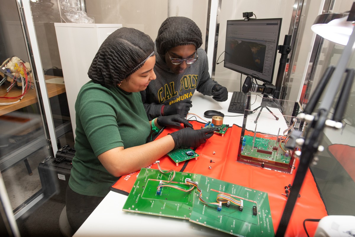 students working on circuit boards