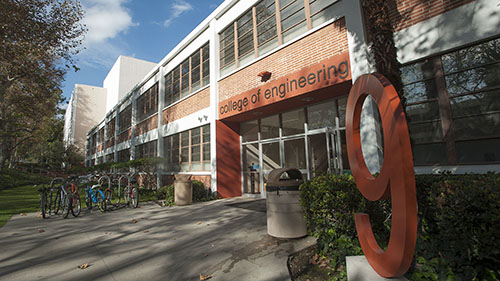 CPP Engineering building 9. Signage on the building reads College of Engineering. A statue of the number 9 sits on the entrance of the building.