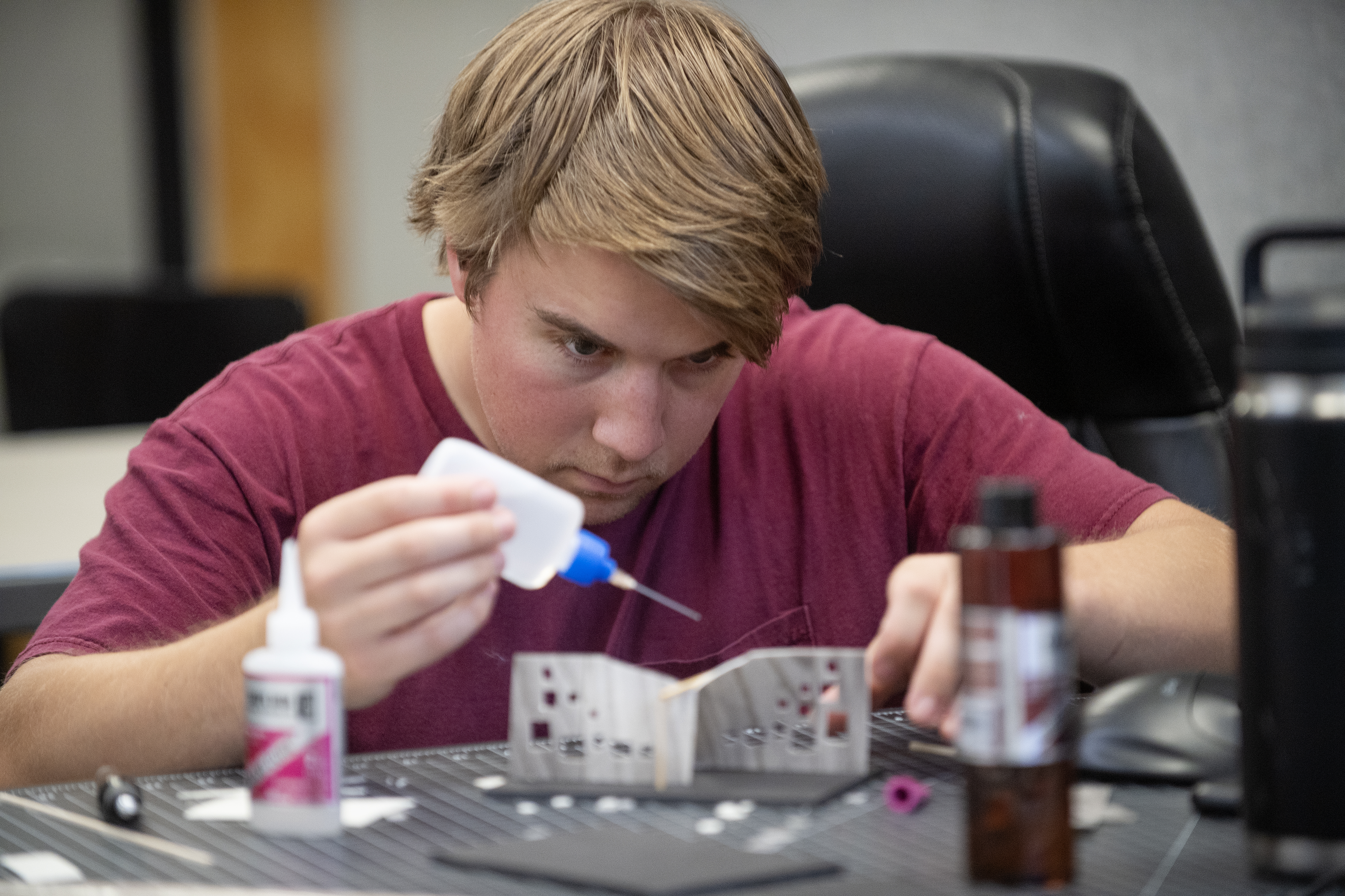 5th Year Architecture major Colin McAuley works on a model of a design during a studio at Cal Poly Pomona. (Tom Zasadzinski)