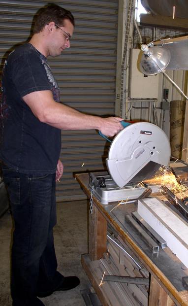 person operating miter saw