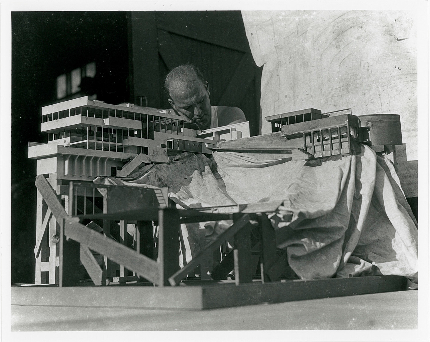 Photo: Raphael Soriano with the model of the Lovell Health House, Photo Credit Unknown