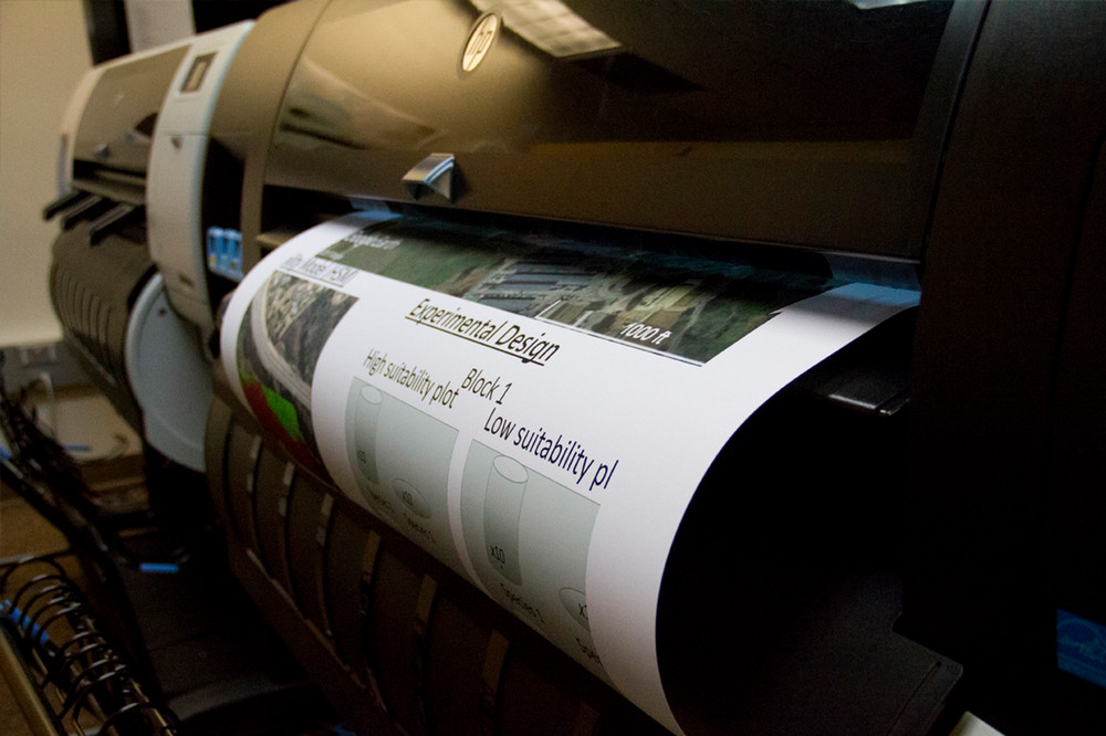 poster coming out of a printer