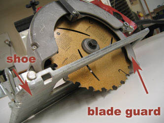 skilll saw with pointers on shoe and blade guard parts