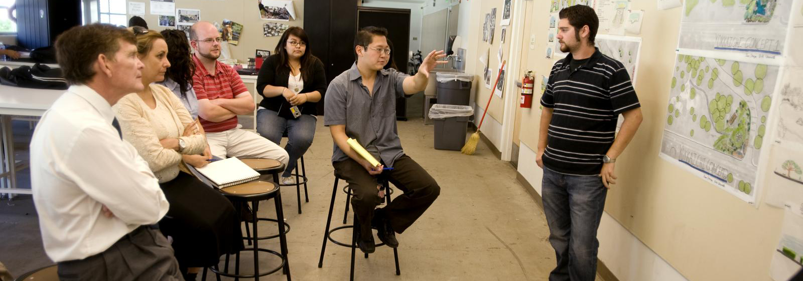 Professionals attend a critique in lecturer Keiji Uesugi's LA 303 studio