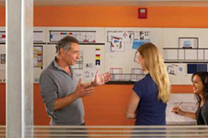 Student speaking with M.Int.Arch Faculty