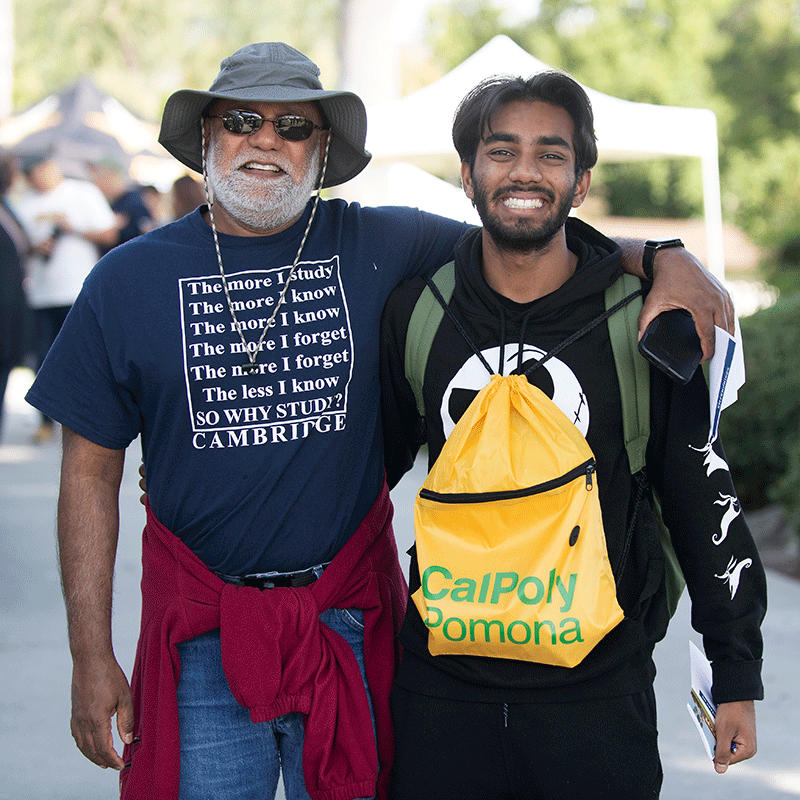 A father and son smile