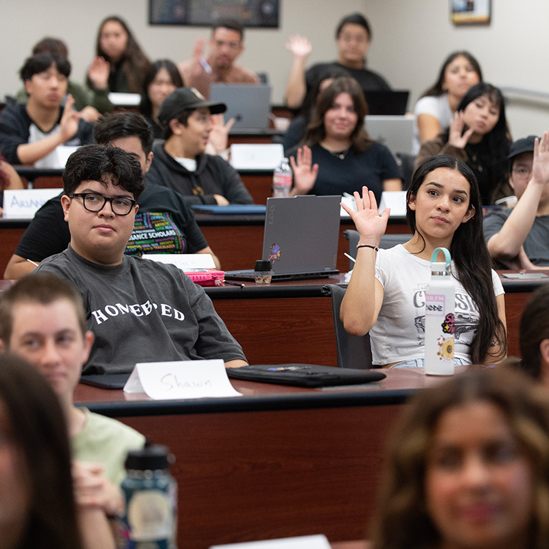Students sit in class on the first day of the fall semester.