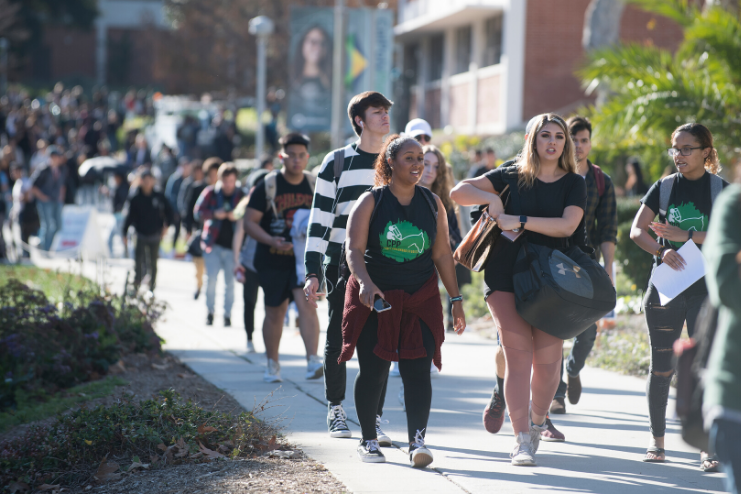 A group of students walking between classes