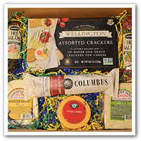 gift box containing crackers, cheeses and meats