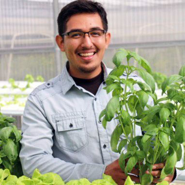 munoz carrying a plant