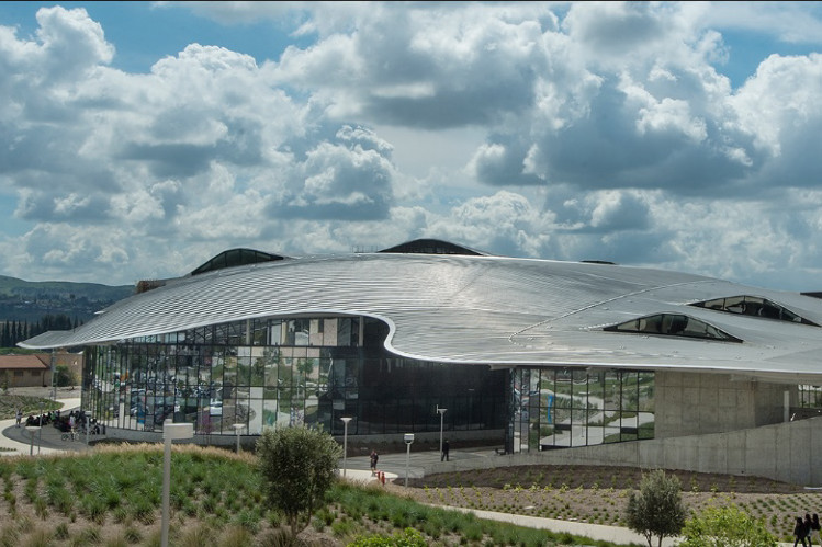 Student Services building with clouds in the background