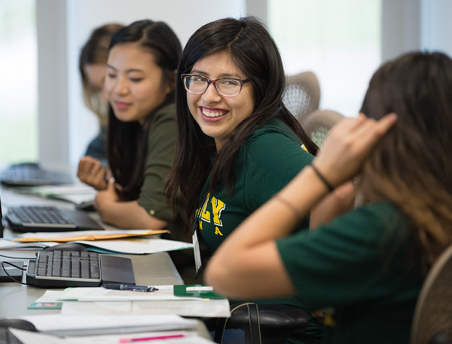 Student in a classroom with other students