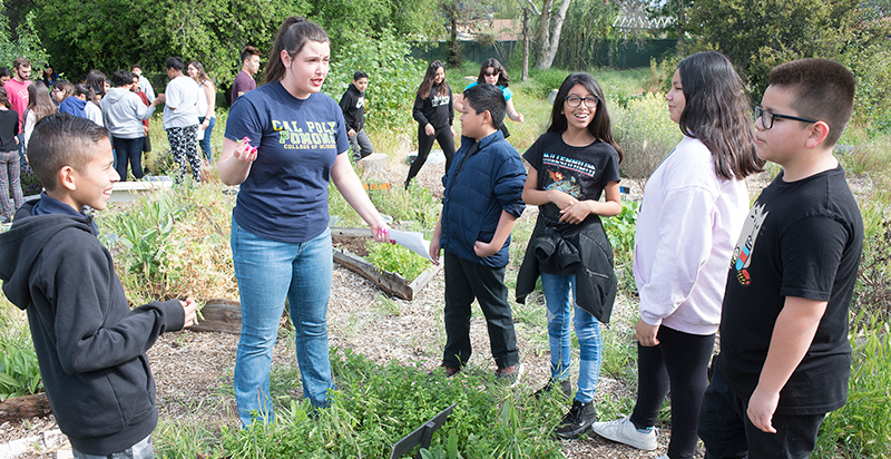 CPP student working with elementary students