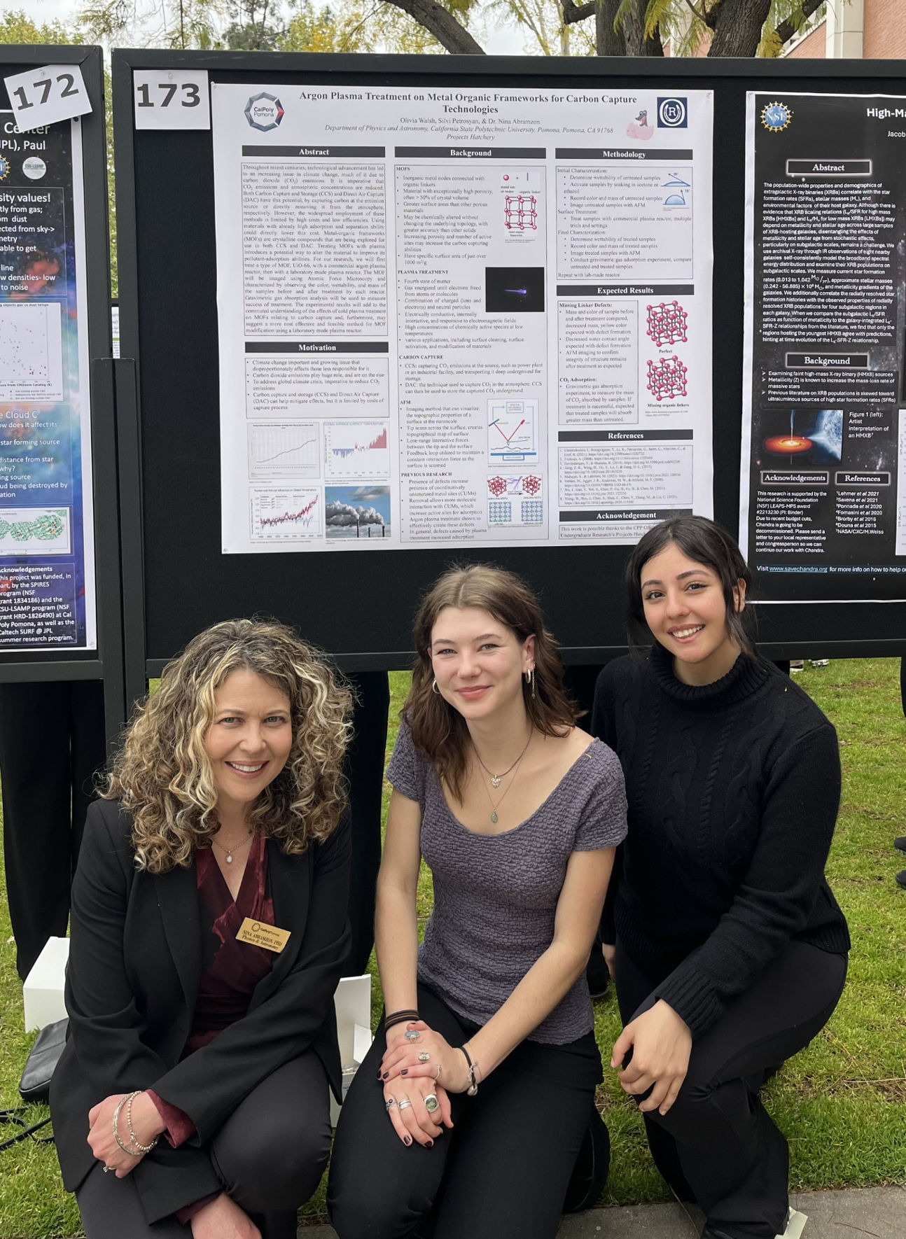 Carbon Catchers posing in front of their research poster with their faculty mentor. 