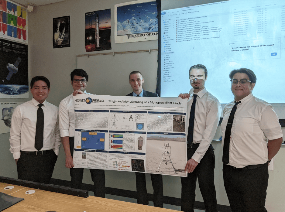 Project Phoenix gathered for a group photo with their research poster.