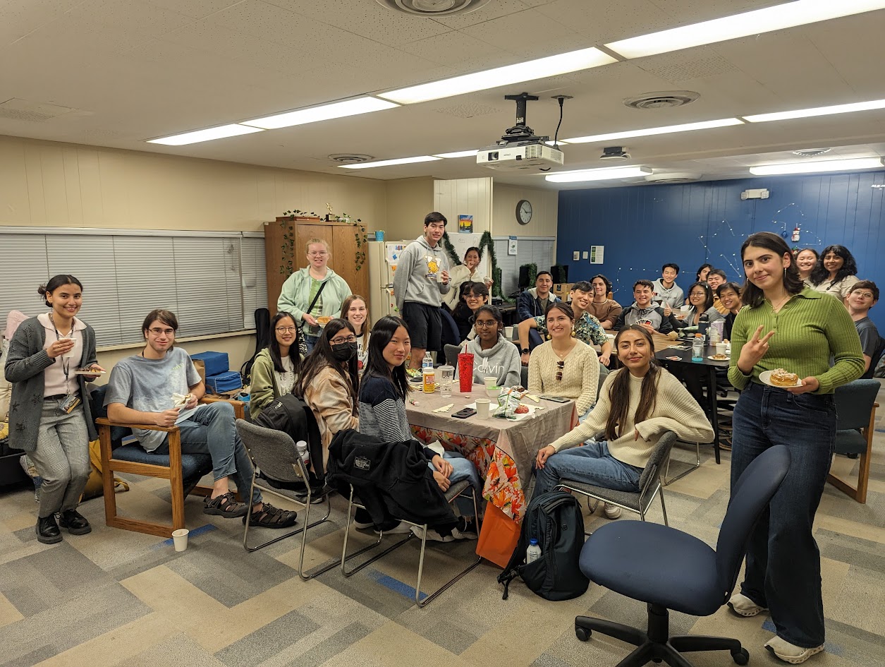 Large group of students gathered together socializing