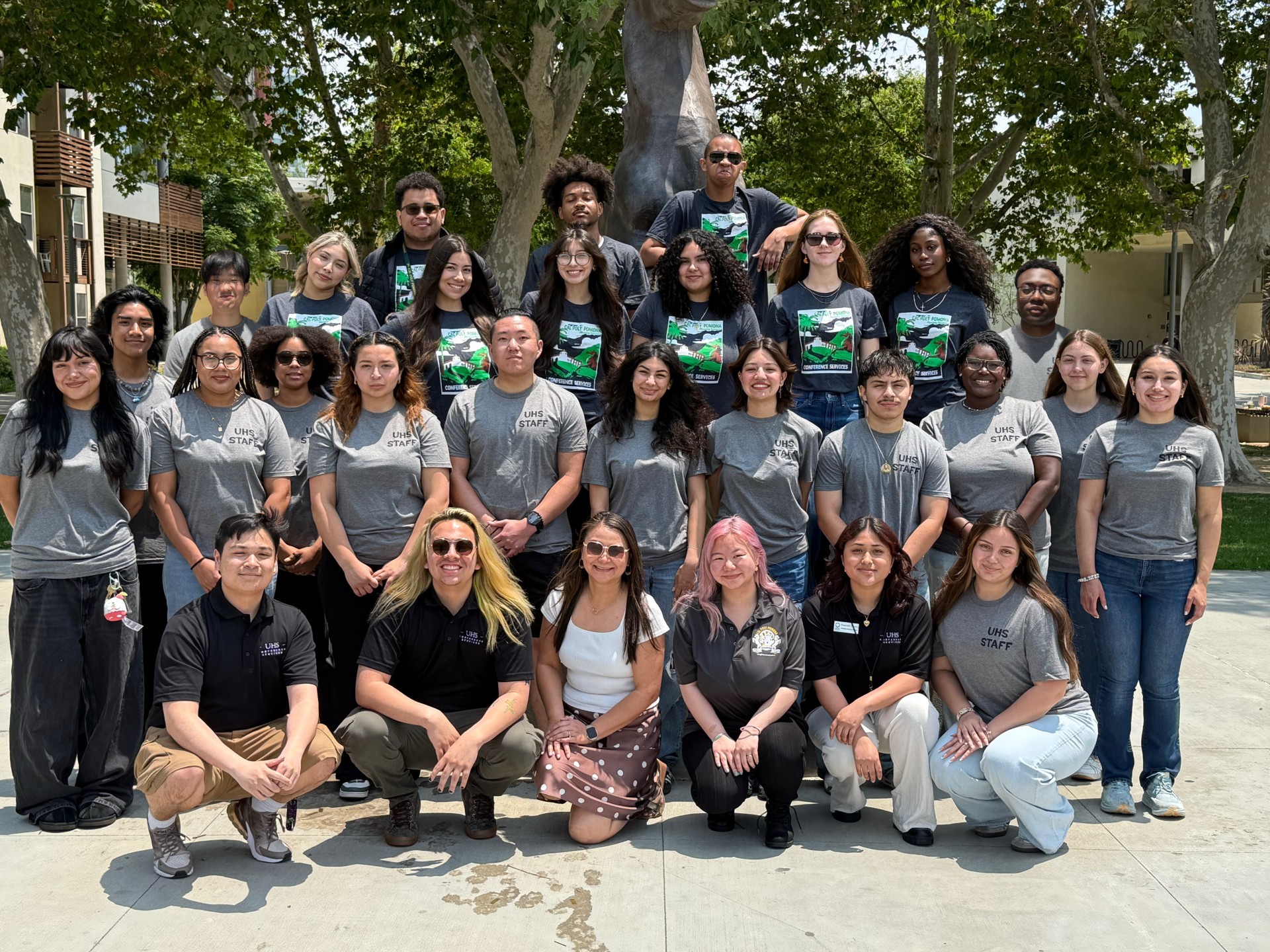 students smiling while on staircase