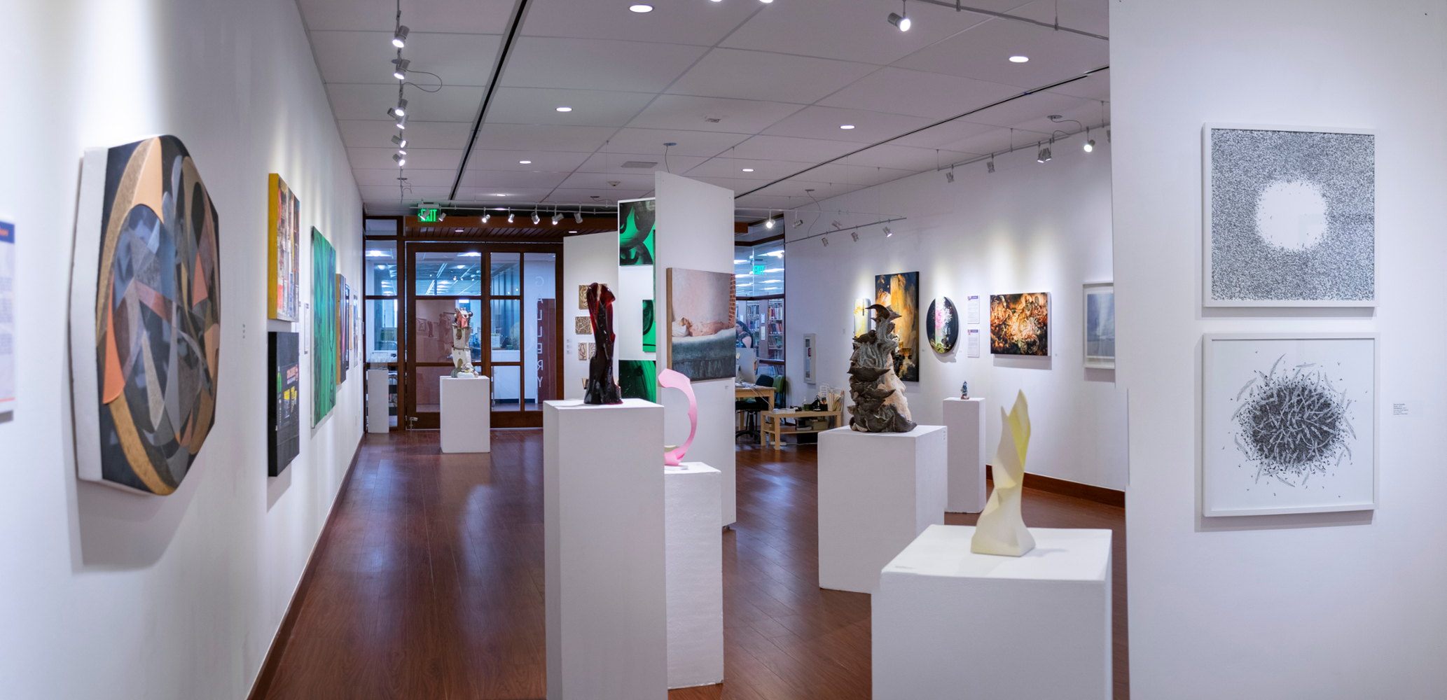 pano view of installations from back corner of gallery