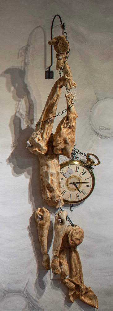 Gina M.  No time to say. from the Lost, Not Forgotten Series, 2018  high-fired ceramic, glaze, clock, hook  90 x 24 x 16”  Courtesy of the artist